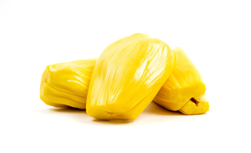 The front view of fresh yellow jackfruit on a white background. Thai fruit concept